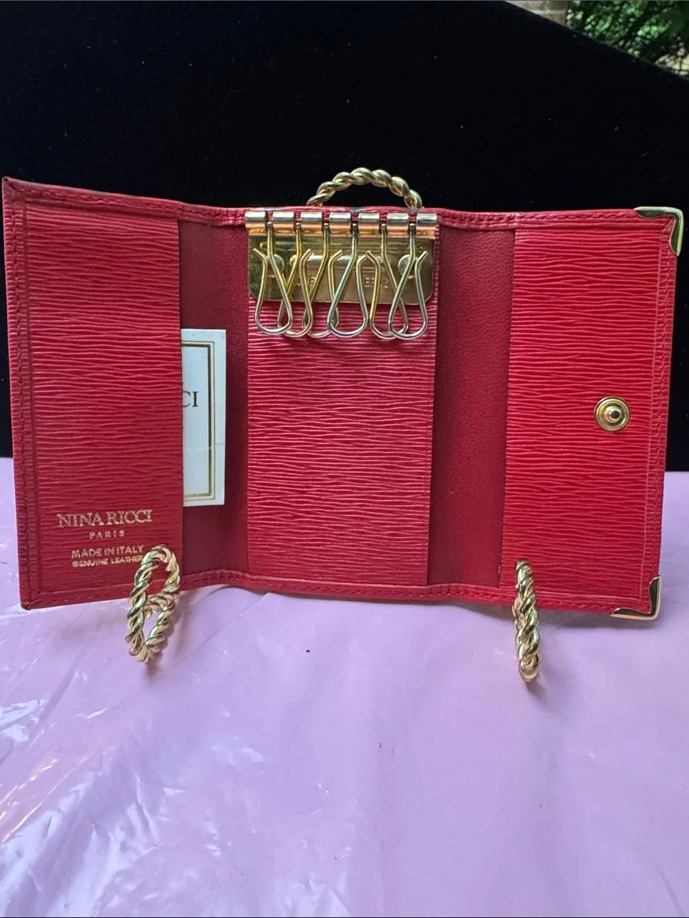 Nina Ricci Red Textured Leather key holder  with Gold Corner Accents